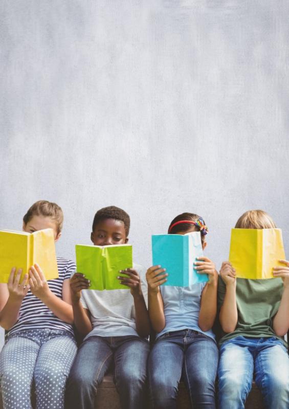 four children with books in front of their faces