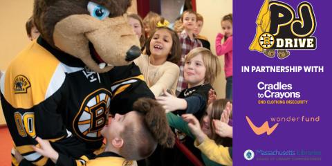 bruins mascot hanging out with excited kids